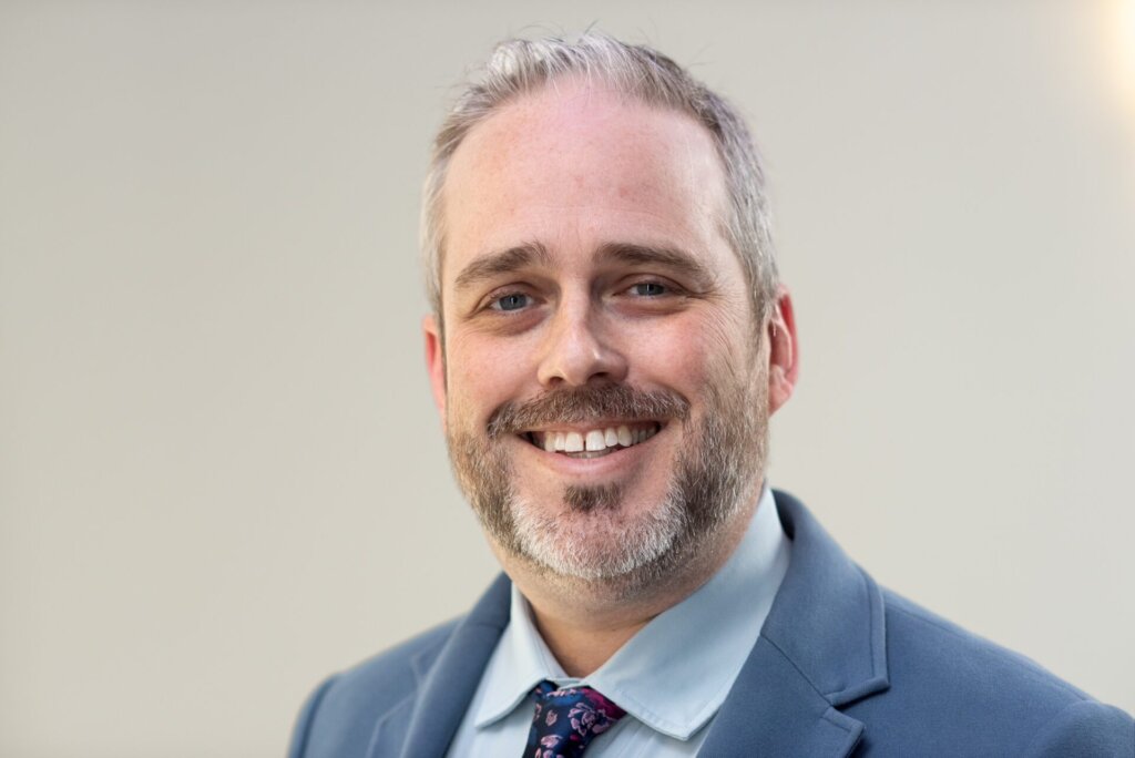 Headshot shows Andrew Toland, the new Communications Partner for Couch Family Foundation
